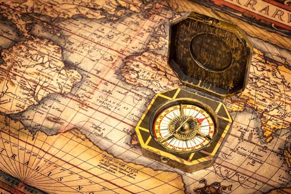vintage-pirate-compass-on-ancient-map-2021-08-26-22-58-15-utc